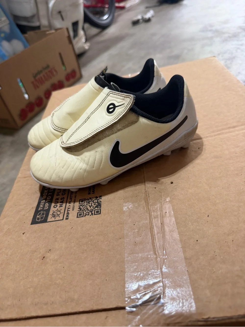 Nike Kids Slip-On Soccer Cleats in Cream and Black